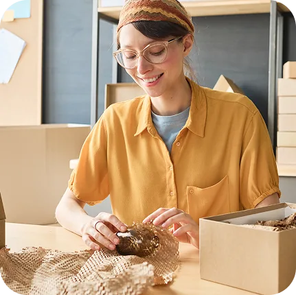 Finishing the wrap before boxes are shipped.